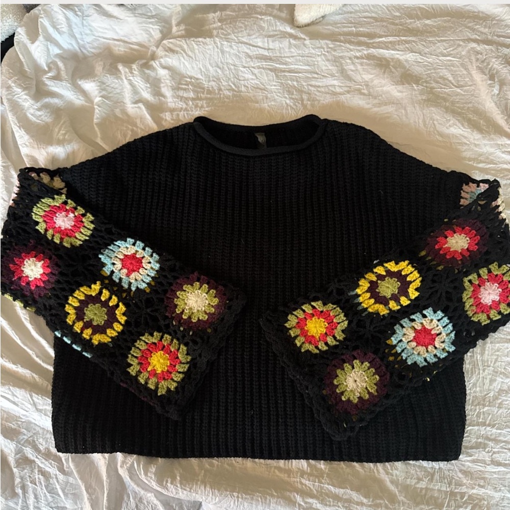 Black sweater with crochet sleeves